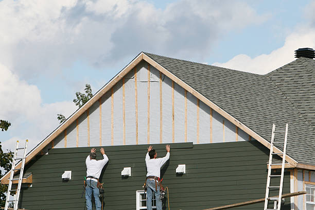 Professional Siding Contractor technician working in Boonville, NC